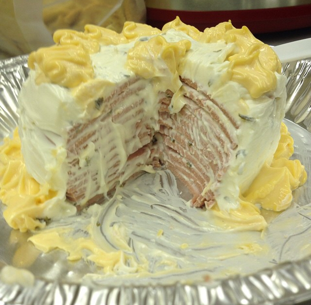 A cake layered with bologna and mayo